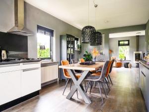 Detached holiday home with jetty and outdoor spa