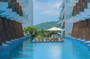 C245 Steps from the Beach Pool & Ocean View