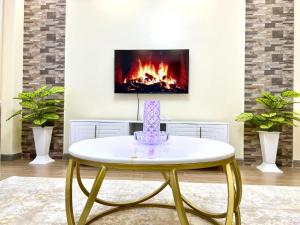 lovely fully furnished two bedroom apartment with heated swimming pool well equipped gym ample parking space children playing ground and a relaxing rooftop with amazing scenic views