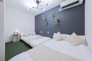 2f 商店街横の庭園を楽しむお風呂付きの宿 4寝室 ベッド12点 バスルーム3点