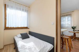 Comfortable Apartment with Parking Space by Noclegi Renters