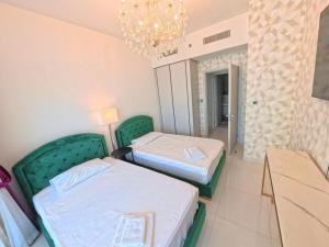 Orange Plumeria 1701 - 2BR SeaView with Prvt Beach