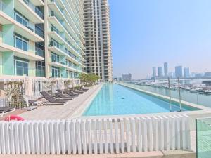Orange Plumeria 1701 - 2BR SeaView with Prvt Beach
