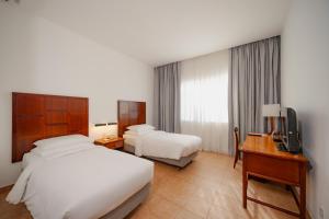 Hulhule Island Hotel- Private Beach Access & Airport Pick-up and Drop