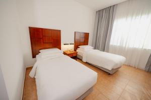 Hulhule Island Hotel- Private Beach Access & Airport Pick-up and Drop
