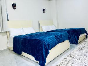 Modern Cozy 2BR Retreat Near Nile Corniche