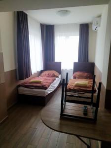 Airport MicrostorePanzió