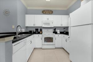 4 Bedrooms 3 Bathrooms Lucaya Village 9-104