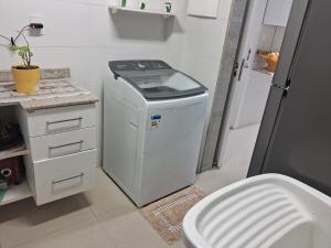 Apartamento Elegante em Prédio de Luxo na Praia das Dunas