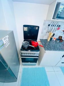 Cosy 2bdrm mombasa CBD pool gym washer AC