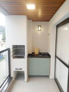 Apto novo na praia da Toninhas 203