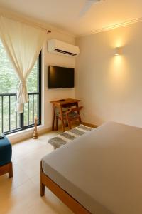 Modern Coastal Stay Airy 1BHK with Balcony