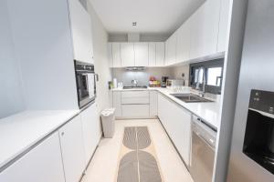 Corner Penthouse with Ocean and City Views with a Content Creator Hub