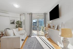 Stylish 2BR Retreat with Pool, Gym & Balcony!