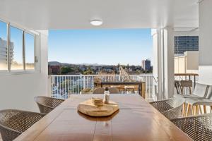 Stylish 2BR Retreat with Pool, Gym & Balcony!