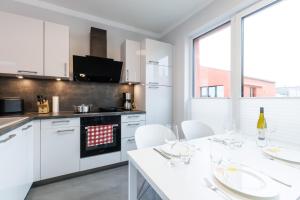 PrimeLoft "Frische Brise" - Penthouse - Fahrstuhl - modern & geräumig - Familien - Dachterasse - Tiefgarage