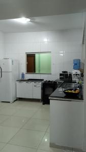 Casa de Verão, 04 quartos, 03 banheiros, piscina e churrasqueira para relaxar