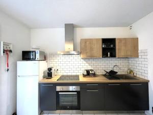 Appartement T2 avec terrasse et jardin privatif - FR-1-379-185