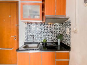Homey 1BR at Signature Park Grande Apartment By Travelio