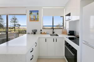 Beachfront Studio with Balcony & Stunning Views