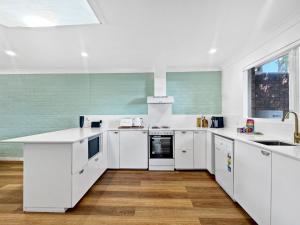 Spacious 2-Bed Townhouse with BBQ by the Beach