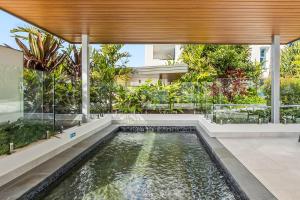 Waterfront 2-Bed Oasis - Pool Steam Jacuzzi Gym