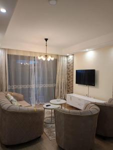 royal essence two bedroom apartment with heated swimming pool ,ample parking equipped gym children playground and amazing scenic city views