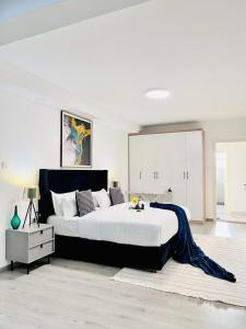 luxury elegant furnished three bedroom apartment with children playing ground,swimming pool relaxing rooftop with amazing city views, ample parking space and proximity to major shopping malls