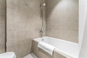 Glimpse of Burj Khalifa 2BR, 15-Minute Drive to Burj Khalifa and Downtown Landmarks, District One Phase III Residences 13, Mohammed Bin Rashid Al Maktoum City by Deluxe Holiday Homes