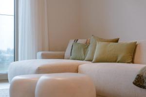 Modern Beach Apartment with Balcony & Parking