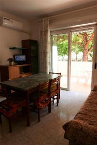 Bright flat with large balcony in Bibione