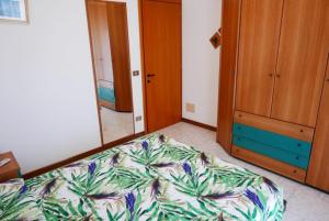 Bright flat with large balcony in Bibione