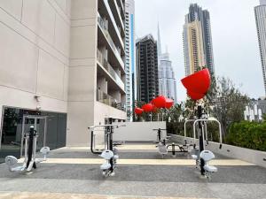 Vogue Vacation Homes, Downtown Mag 318 near Burj Khalifa and Dubai Mall, Studio Apartment with Balcony and City View, Access toAmenities