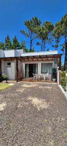 Studio privativo com wifi e ar condicionado 250m do mar