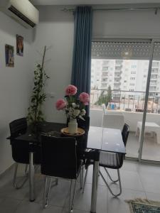 Magnifique appartement avec vue dégagée, près de laéroport et parking privé