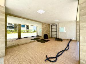 Apartamento em Condomínio Frente-Mar com Piscinas, Jacuzzi Aquecida, Sauna, Academia, Brinquedoteca, Churrasqueira na Sacada, Cozinha Completa e Lazer de Home Club