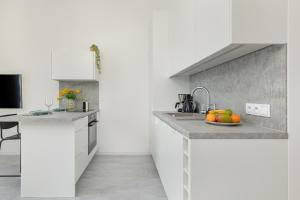 Nowoczesne Apartamenty Typu Studio z Parkingiem by Noclegi Renters