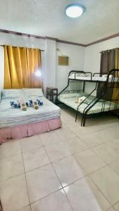 Len Staycation in Panabo 3BDR-2BR-Downstairs Wifi Netflix