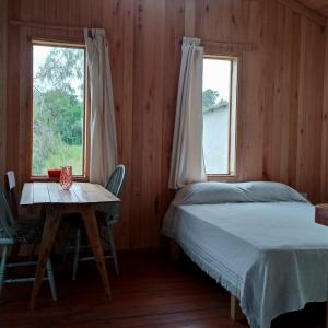 Cabaña entre molles