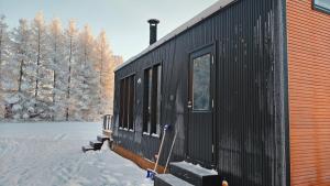 Cottage on the banks of the Ounasjoki River