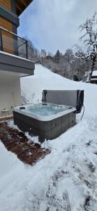 LAiguillon - Studio avec Jacuzzi pour 2 personnes et enfants proche stations - Idéal couple avec 1 enfant