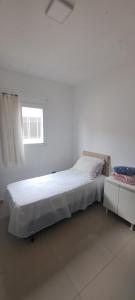 Apartamento com piscina e wifi, 8 minutos da praia!