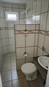 Single-story house with pool and barbecue area