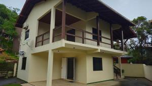 Single-story house with pool and barbecue area
