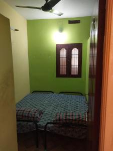Guest House Check in 8PM Check out 8AM Next Day NEAR Kamatchi Amman Temple Non AC