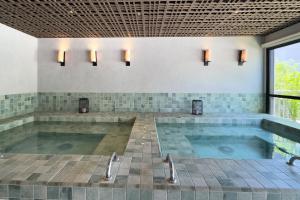 Studio moderno com vista e lazer - Wecare Hosting