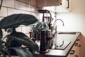 Green Oasis in SoFo with Balcony and Workspace