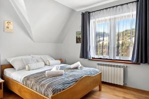 Gut Apartment - 2 sypialnie, duża kuchnia, kino domowe NETFLIX & HBO, kryty parking, szybkie WIFI, 5km od Zakopane