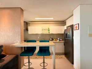 Apartamento moderno e alto com 3 quartos