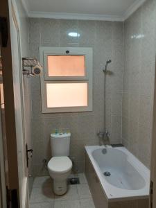 شقة فندقية راقية بالقرب من المتحف المصري الكبير وبالقرب من الأهرامات بكمبوند اشجار سيتي اكتوبر